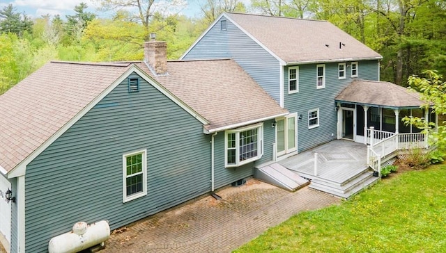 10 Eagle Rd, Winchendon, MA 01475 - rear view of property featuring a chimney, a lawn, and roof with shingles