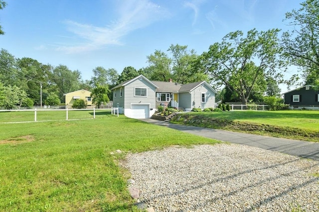 606 Granby Rd, South Hadley, MA 01075 - ranch-style home with asphalt driveway and an attached garage