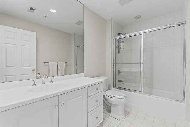 1003 Wisteria Way Unit 1003, Wayland, MA 01778 - full bathroom with vanity, toilet, tile patterned floors, and combined bath / shower with glass door