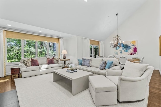 1003 Wisteria Way Unit 1003, Wayland, MA 01778 - living room featuring a chandelier, recessed lighting, vaulted ceiling, baseboards, and wood finished floors