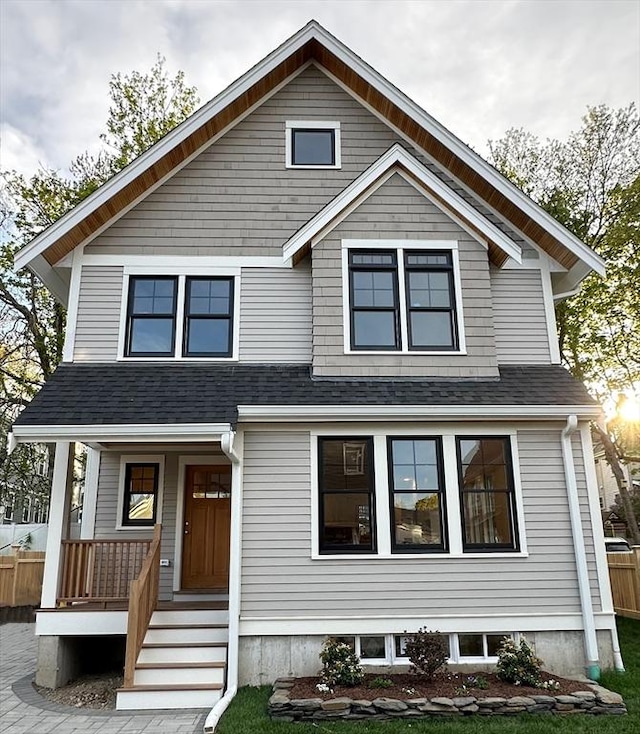 2 Wilkins Pl, Boston, MA 02131 - view of front of house featuring a porch, fence, and roof with shingles