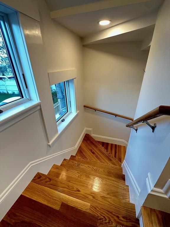 2 Wilkins Pl, Boston, MA 02131 - stairs with wood finished floors and baseboards