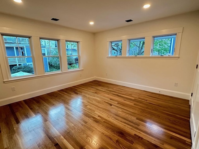 2 Wilkins Pl, Boston, MA 02131 - empty room with baseboards, wood finished floors, and recessed lighting
