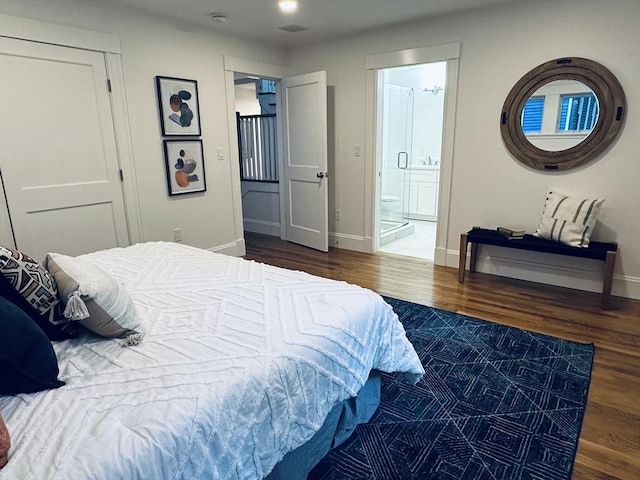 2 Wilkins Pl, Boston, MA 02131 - bedroom featuring baseboards, wood finished floors, and ensuite bath
