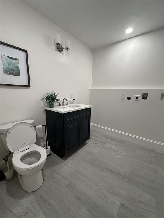 2 Wilkins Pl, Boston, MA 02131 - bathroom featuring toilet, vanity, and recessed lighting