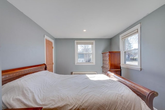 bedroom with radiator heating unit