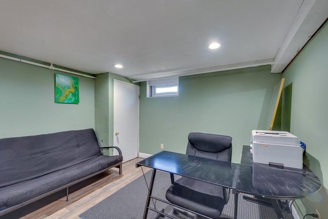 home office with wood-type flooring