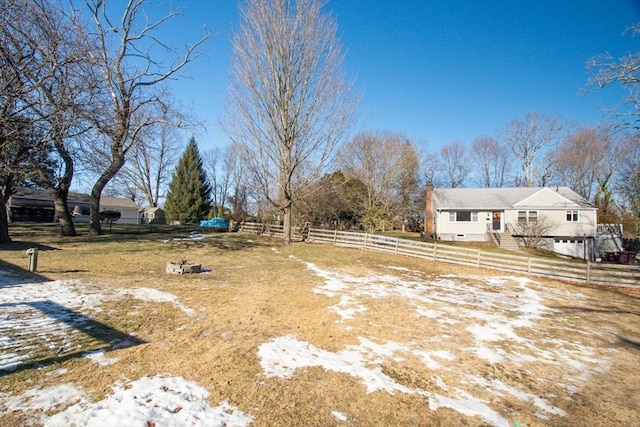 view of yard covered in snow