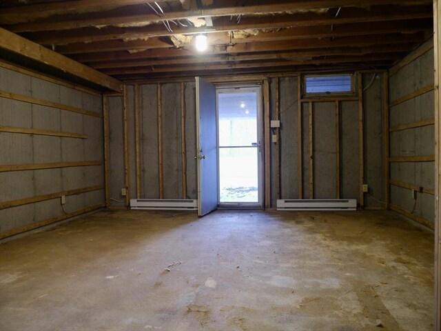 basement with a baseboard heating unit