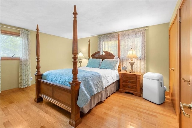 bedroom featuring light wood-style floors