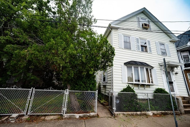 102 Margin St, Salem, MA 01970 - view of front facade featuring a gate and cooling unit