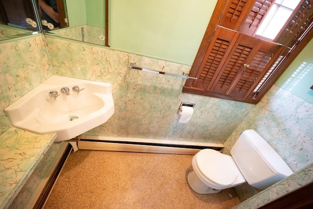 102 Margin St, Salem, MA 01970 - half bath with toilet, a baseboard radiator, and a sink