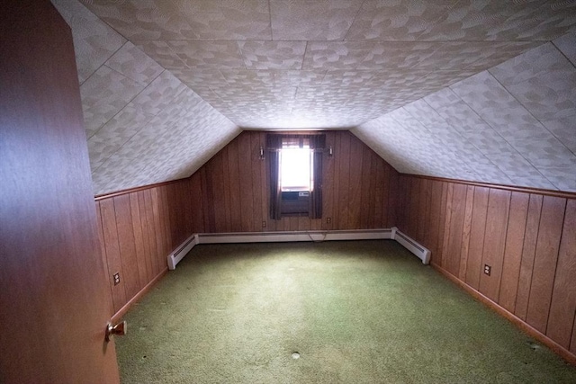 102 Margin St, Salem, MA 01970 - bonus room featuring a baseboard heating unit, wooden walls, carpet, and lofted ceiling