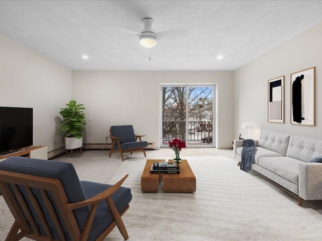 living room featuring ceiling fan and recessed lighting