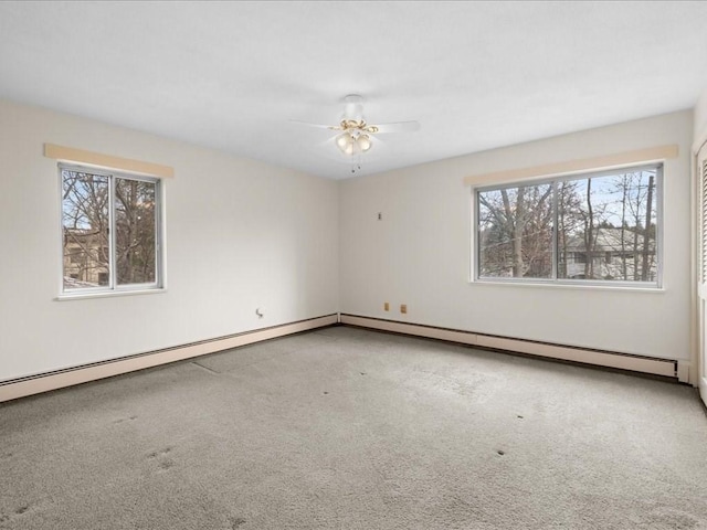 unfurnished room featuring carpet floors and a ceiling fan