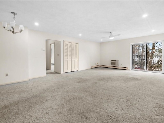 unfurnished room with carpet, a baseboard radiator, recessed lighting, baseboards, and ceiling fan with notable chandelier