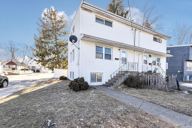 view of front of home with fence