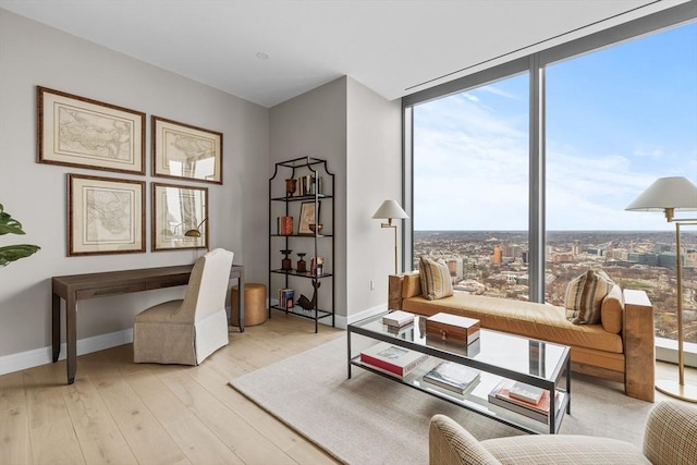 interior space featuring light hardwood / wood-style floors and floor to ceiling windows