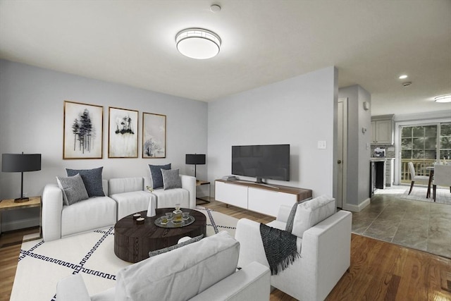 living room with dark wood-type flooring