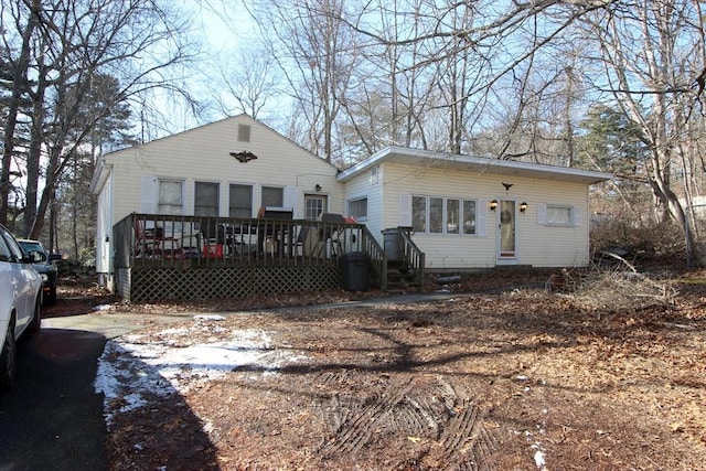 view of front of house featuring a wooden deck