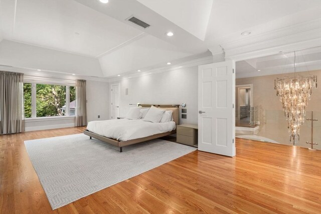 69 Princeton Rd, Brookline, MA 02467 - bedroom featuring lofted ceiling, wood finished floors, recessed lighting, a chandelier, and crown molding
