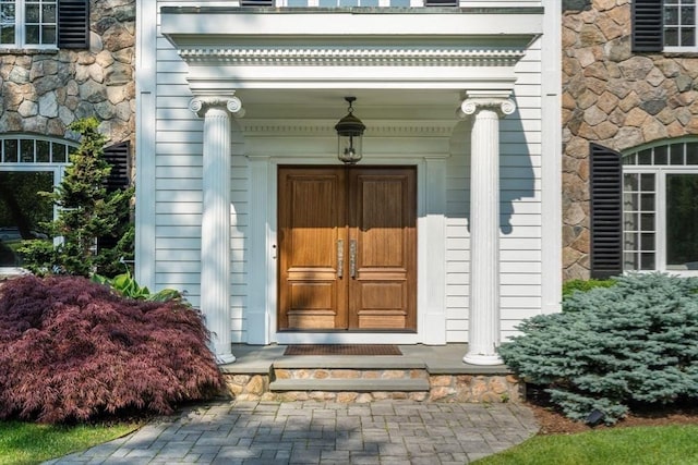 69 Princeton Rd, Brookline, MA 02467 - property entrance with stone siding