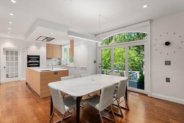 69 Princeton Rd, Brookline, MA 02467 - dining room featuring recessed lighting and light wood-style floors