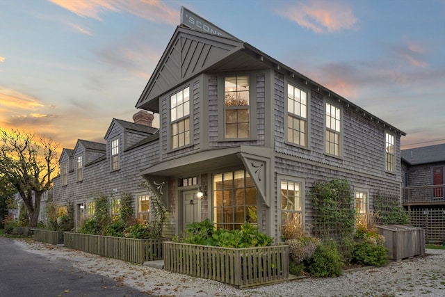 view of property exterior at dusk