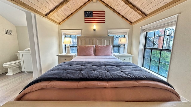 bedroom with wooden ceiling, beam ceiling, light hardwood / wood-style flooring, and high vaulted ceiling