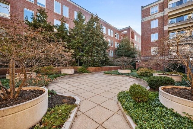 130 Mount Auburn St Unit 310, Cambridge, MA 02138 - view of home's community with a patio