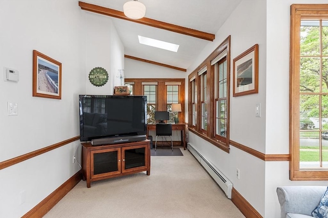 14 Glendale Ave, Melrose, MA 02176 - living room with a baseboard heating unit, a skylight, baseboards, and light carpet