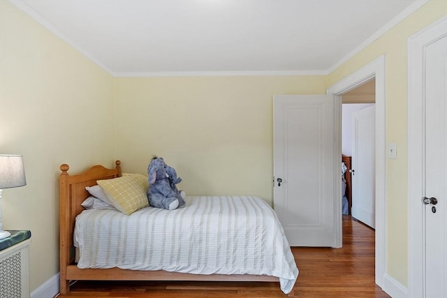 14 Glendale Ave, Melrose, MA 02176 - bedroom featuring wood finished floors, ornamental molding, and baseboards