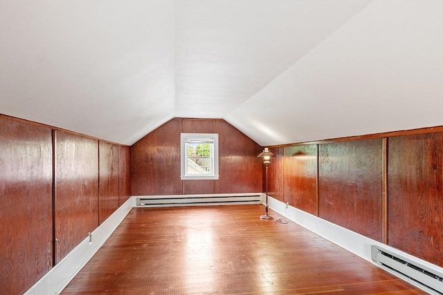 14 Glendale Ave, Melrose, MA 02176 - bonus room featuring baseboard heating, wood finished floors, and lofted ceiling