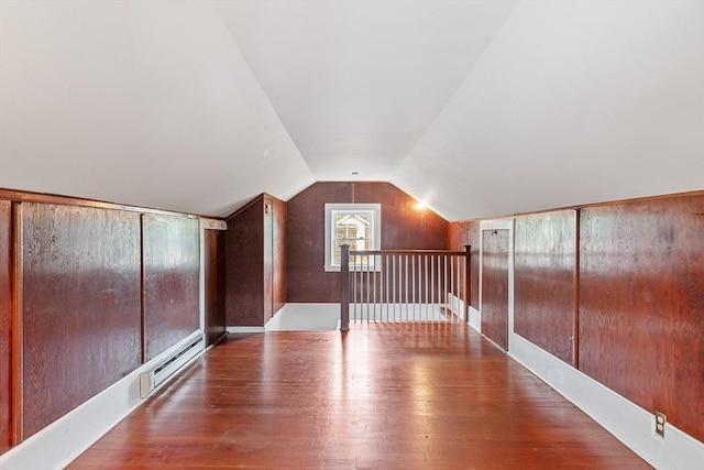 14 Glendale Ave, Melrose, MA 02176 - additional living space featuring a baseboard heating unit, hardwood / wood-style floors, and lofted ceiling