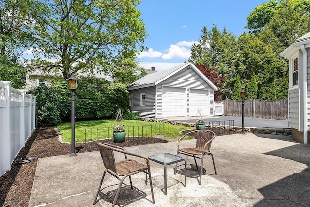 14 Glendale Ave, Melrose, MA 02176 - view of patio / terrace with an outbuilding and a detached garage