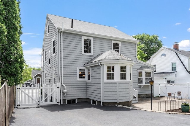 14 Glendale Ave, Melrose, MA 02176 - rear view of property with a gate, entry steps, and a patio area