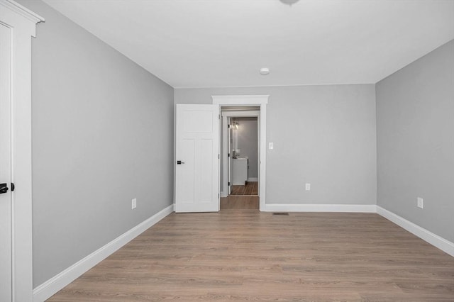 unfurnished bedroom with light hardwood / wood-style flooring