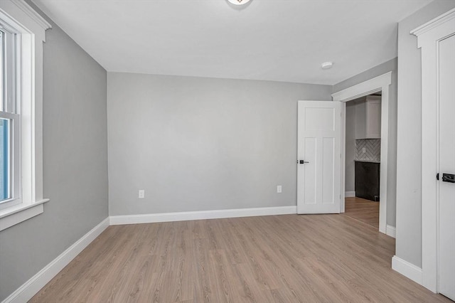 empty room featuring light hardwood / wood-style floors