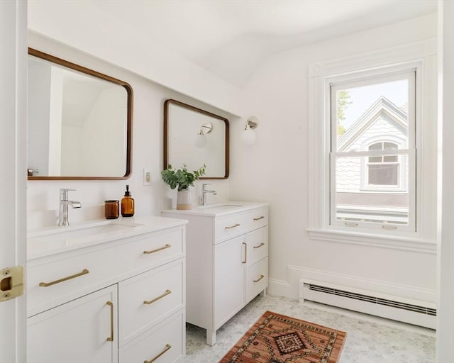 31 Kidder Ave Unit 31, Somerville, MA 02144 - bathroom featuring a baseboard heating unit, two vanities, and lofted ceiling
