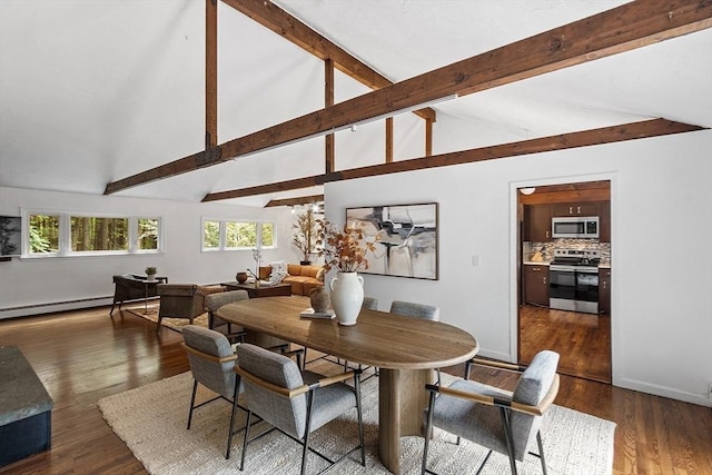 dining room featuring a baseboard heating unit, dark wood-style floors, and a healthy amount of sunlight