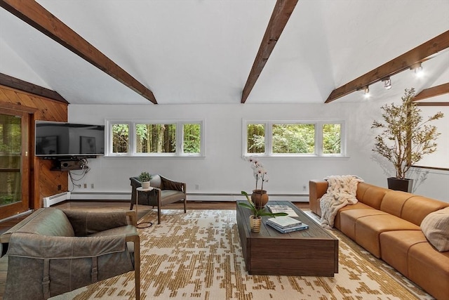 living area featuring vaulted ceiling with beams and a baseboard heating unit