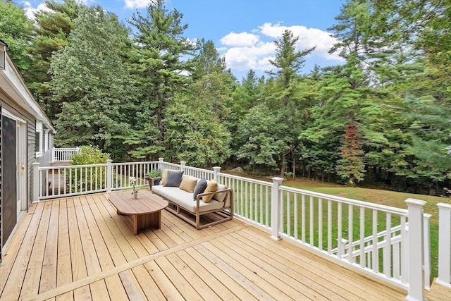 deck featuring a yard and an outdoor living space