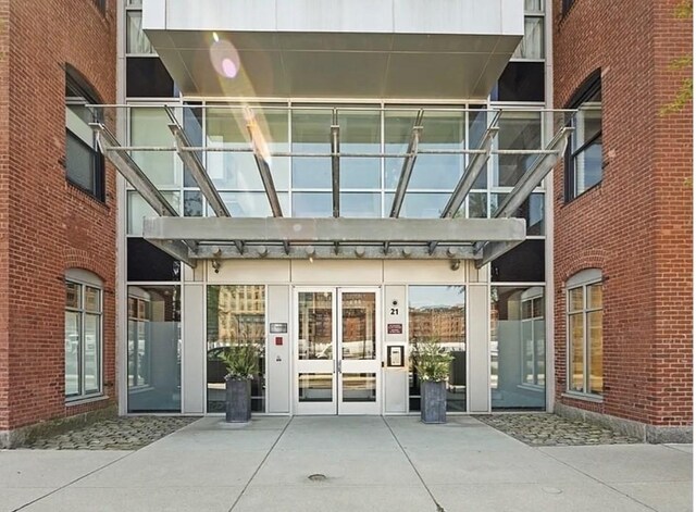 21 Wormwood St Unit 218, Boston, MA 02210 - property entrance with a pergola and french doors