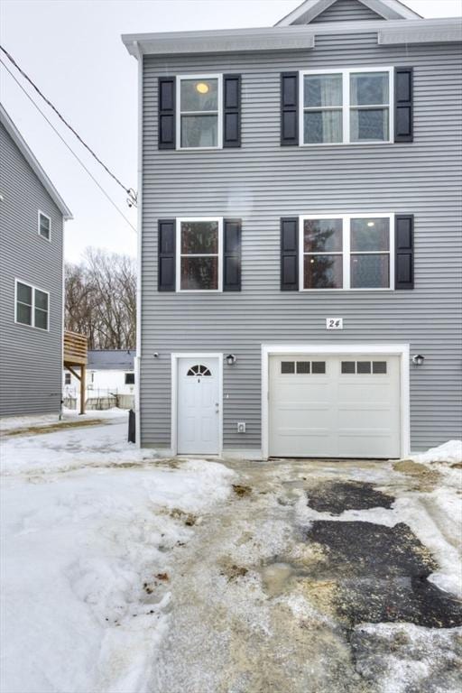 view of front of home with a garage