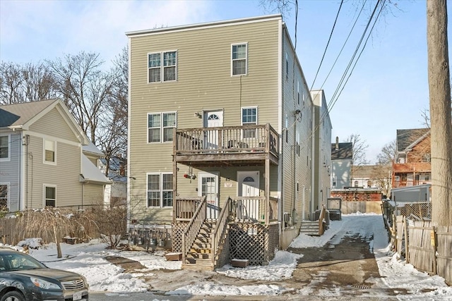 view of snow covered house