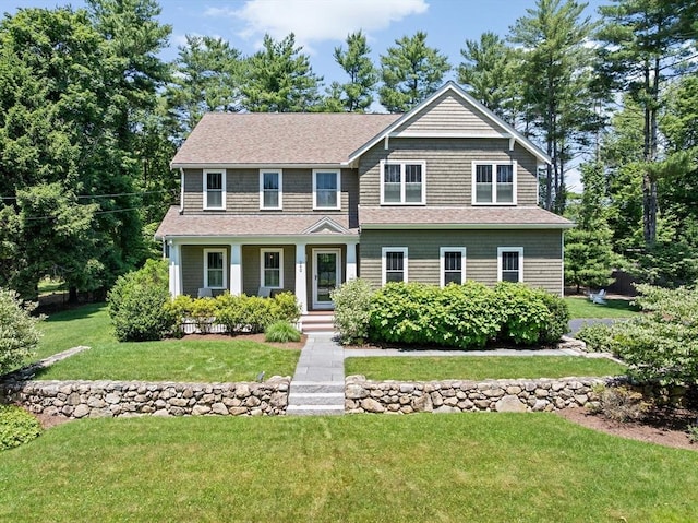 260 Beaver Dam Rd, Scituate, MA 02066 - view of front of property with a front yard, a porch, and a shingled roof