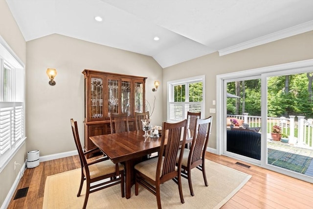 260 Beaver Dam Rd, Scituate, MA 02066 - dining area with lofted ceiling, light wood-type flooring, and recessed lighting