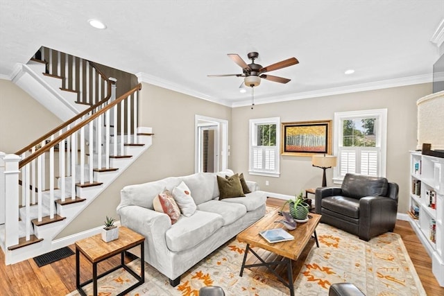 260 Beaver Dam Rd, Scituate, MA 02066 - living area with wood finished floors, ceiling fan, stairs, ornamental molding, and recessed lighting