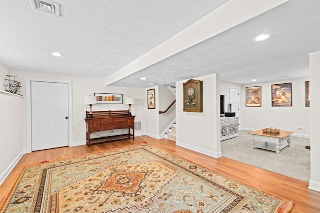260 Beaver Dam Rd, Scituate, MA 02066 - entryway featuring wood finished floors, stairway, and recessed lighting