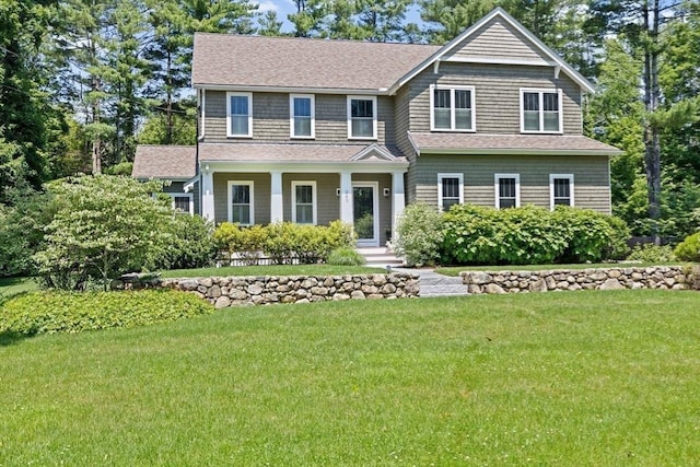 260 Beaver Dam Rd, Scituate, MA 02066 - view of front of house with a front yard, a porch, and a shingled roof